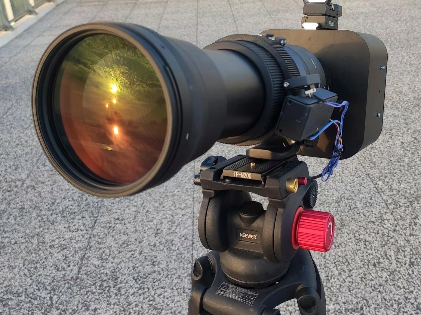 The CSHR sighted on a distant scene, low sun in the objective.